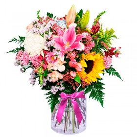 Florero en con Liliums Rosados Girasoles Mables y Solidagos y flores mix Florero en con Liliums Rosados Girasoles Mables y Solidagos y flores mix